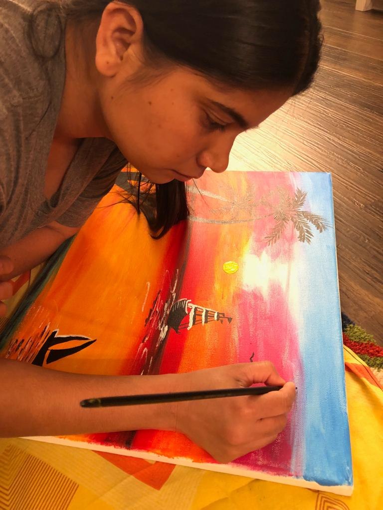 Nargis painting an original canvas